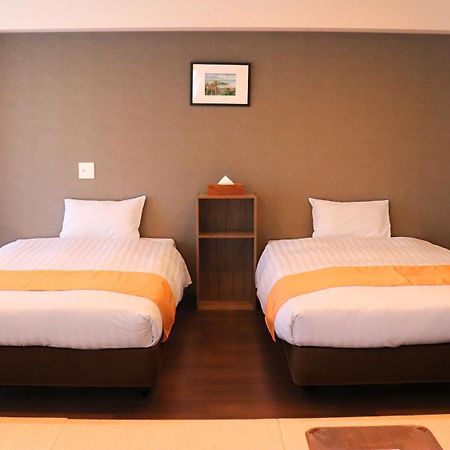 Apartment Hotel Ecott Kagoshima Buitenkant foto