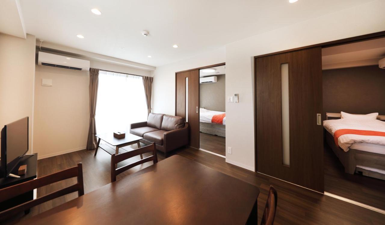 Apartment Hotel Ecott Kagoshima Buitenkant foto