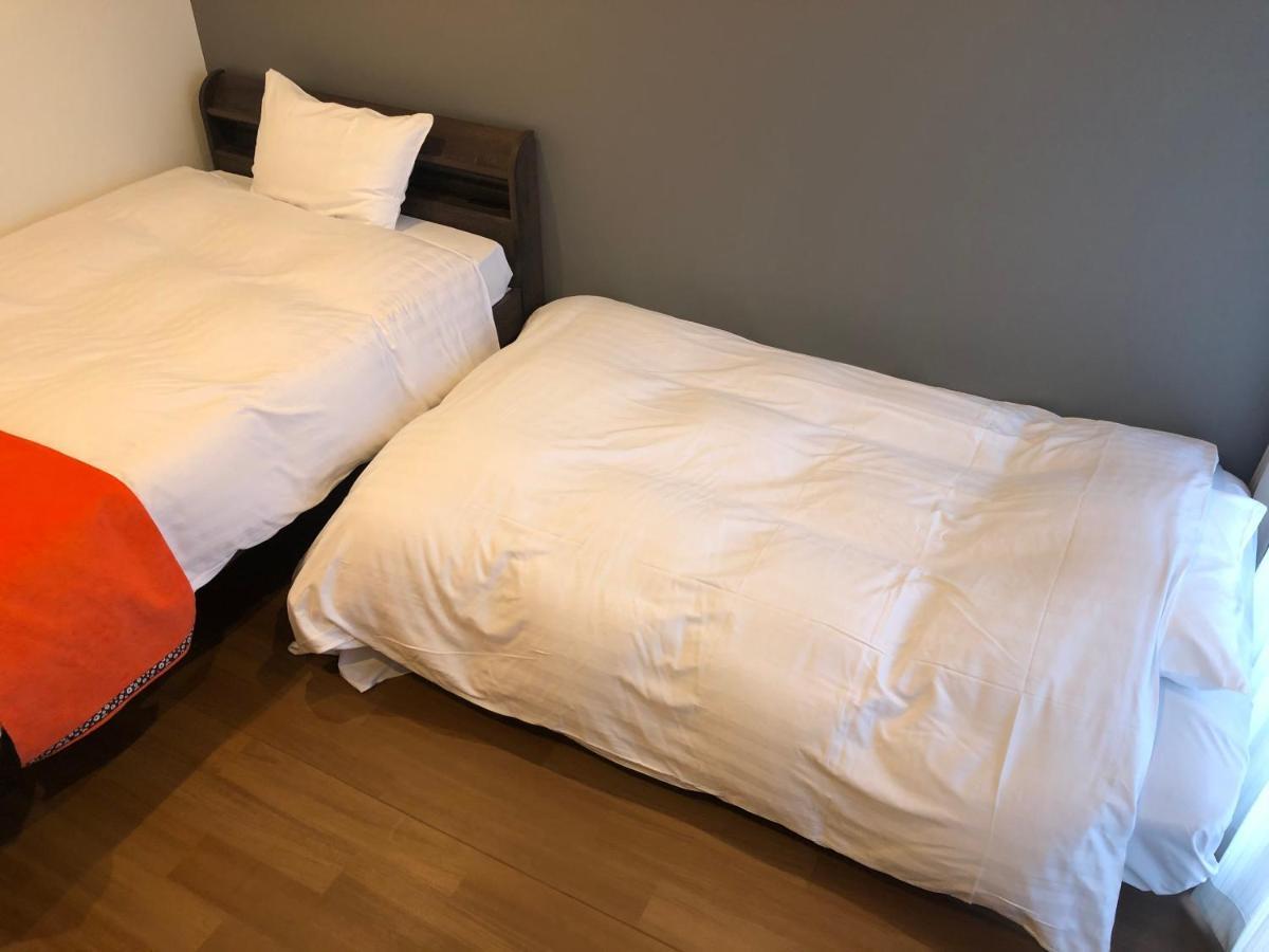 Apartment Hotel Ecott Kagoshima Buitenkant foto