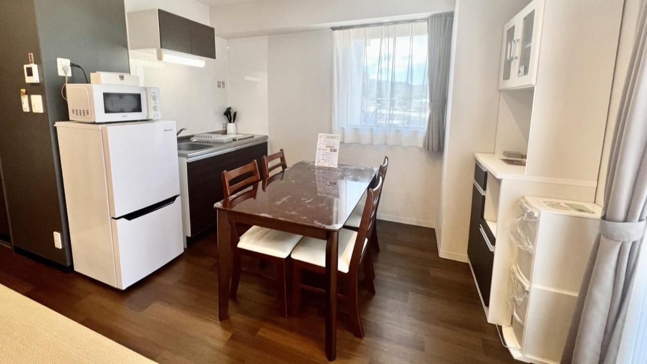 Apartment Hotel Ecott Kagoshima Buitenkant foto