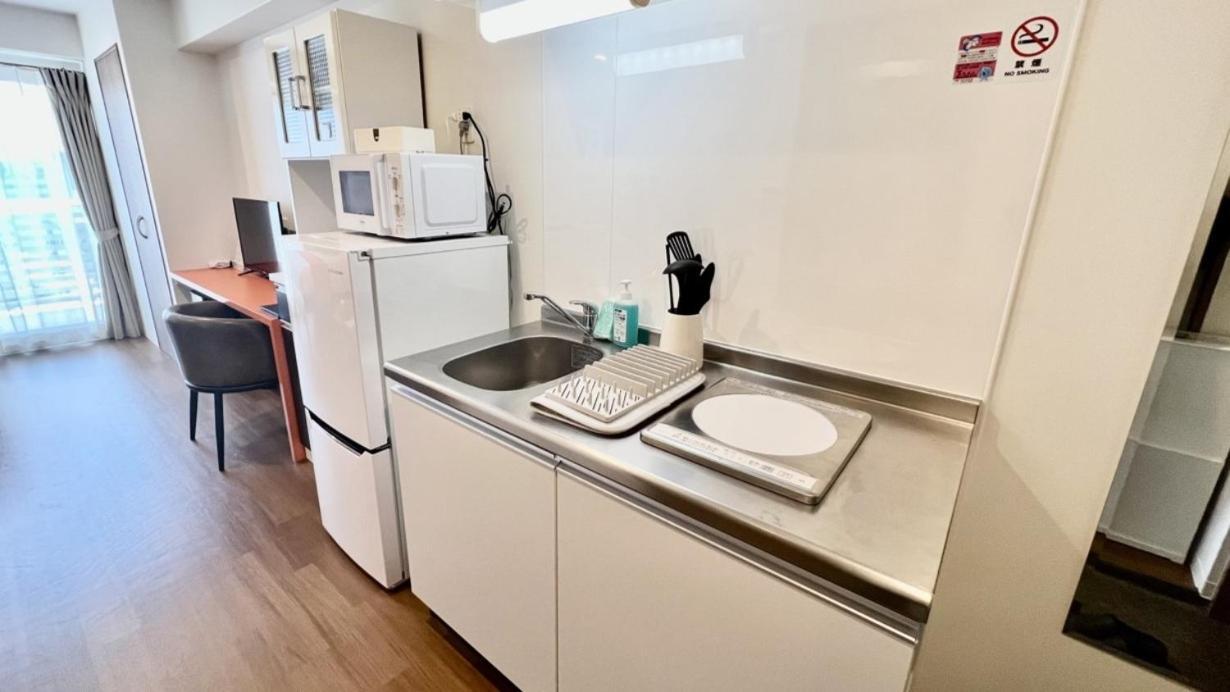 Apartment Hotel Ecott Kagoshima Buitenkant foto