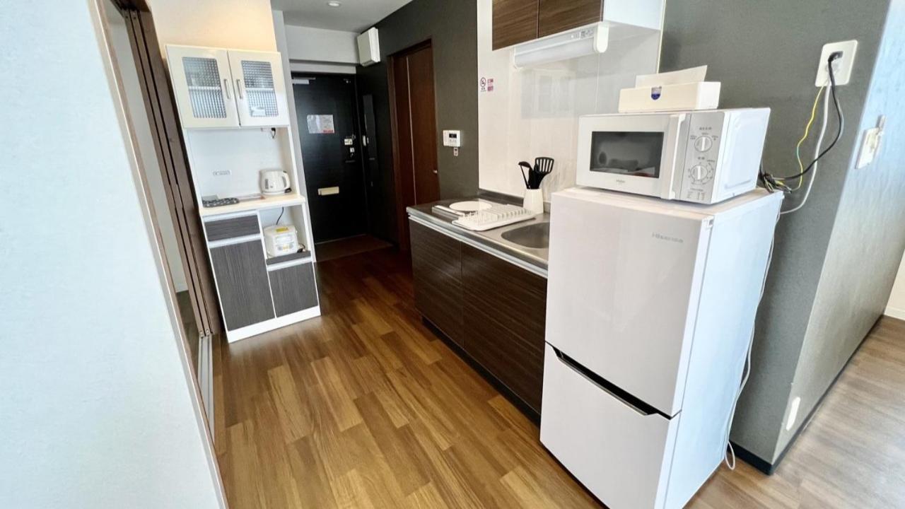 Apartment Hotel Ecott Kagoshima Buitenkant foto