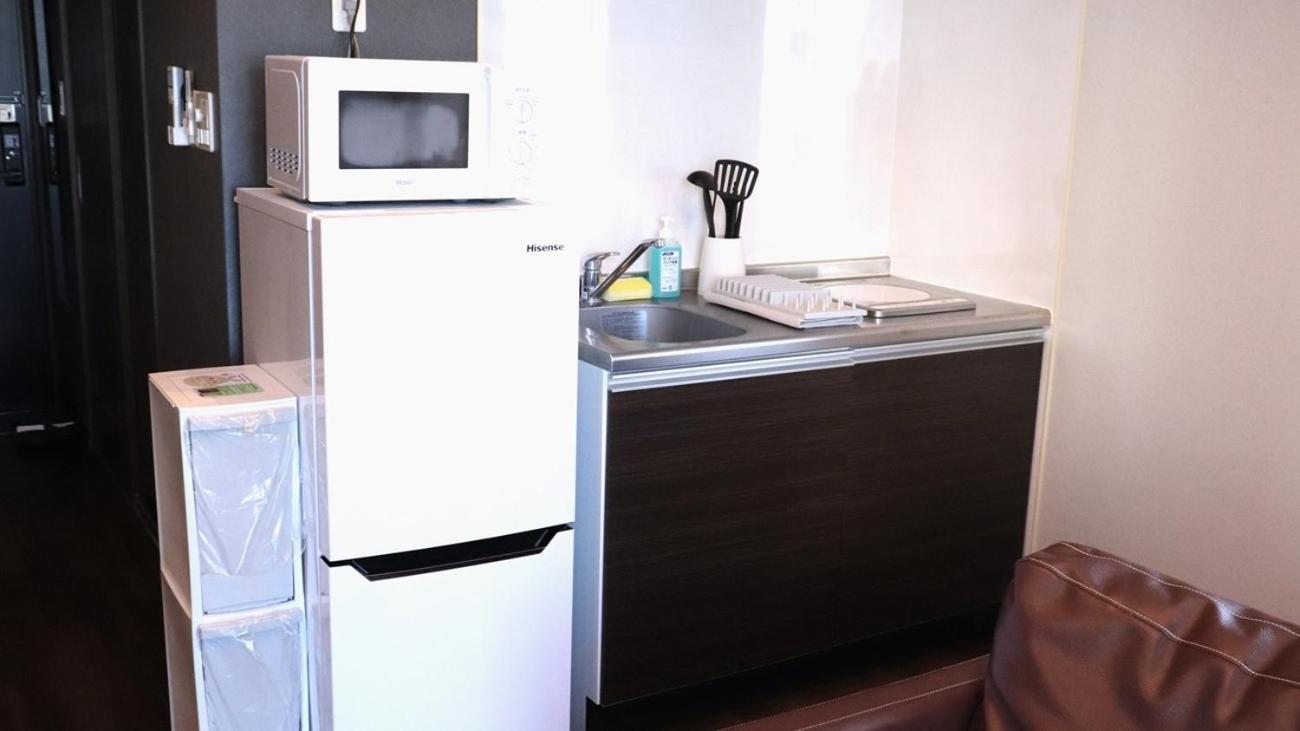 Apartment Hotel Ecott Kagoshima Buitenkant foto